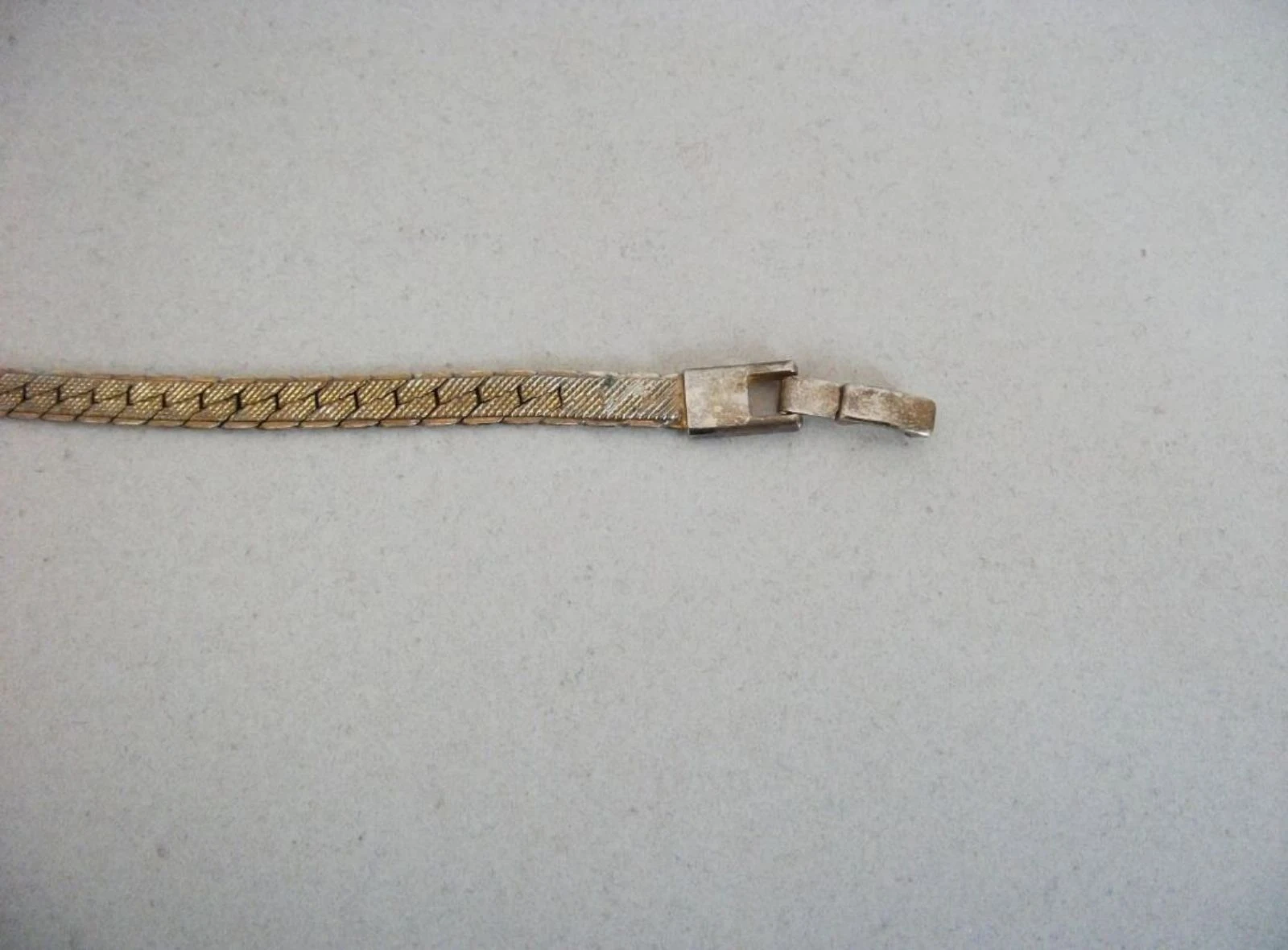 Gouden sieradenarmband van metaal – photo 4